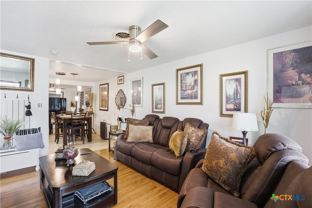 503 Cardinal Avenue Killeen, TX 76541 - Photo 4 of 26 a living room with furniture and wooden floor
