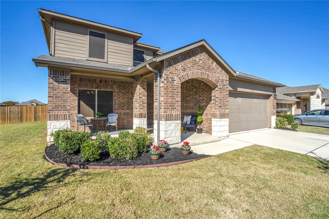 625 Topaz Lane Leander, TX 78641 - Photo 1 of 1 a front view of a house with garden