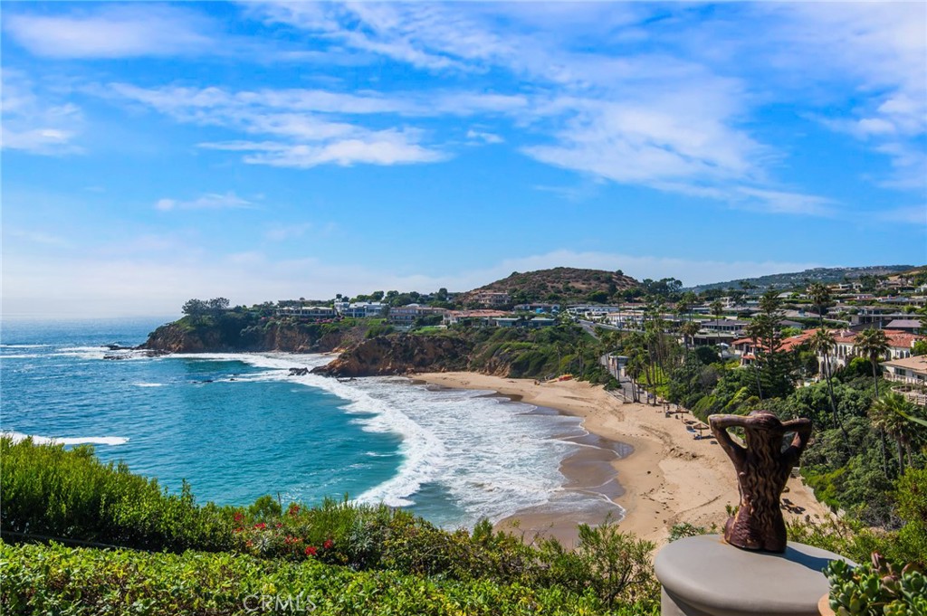 199 Emerald Bay Laguna Beach, CA 92651 - Photo 18 of 33 a view of a lake with beach and city view
