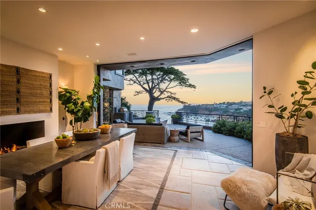 a very nice looking living room with a large window and a couch
