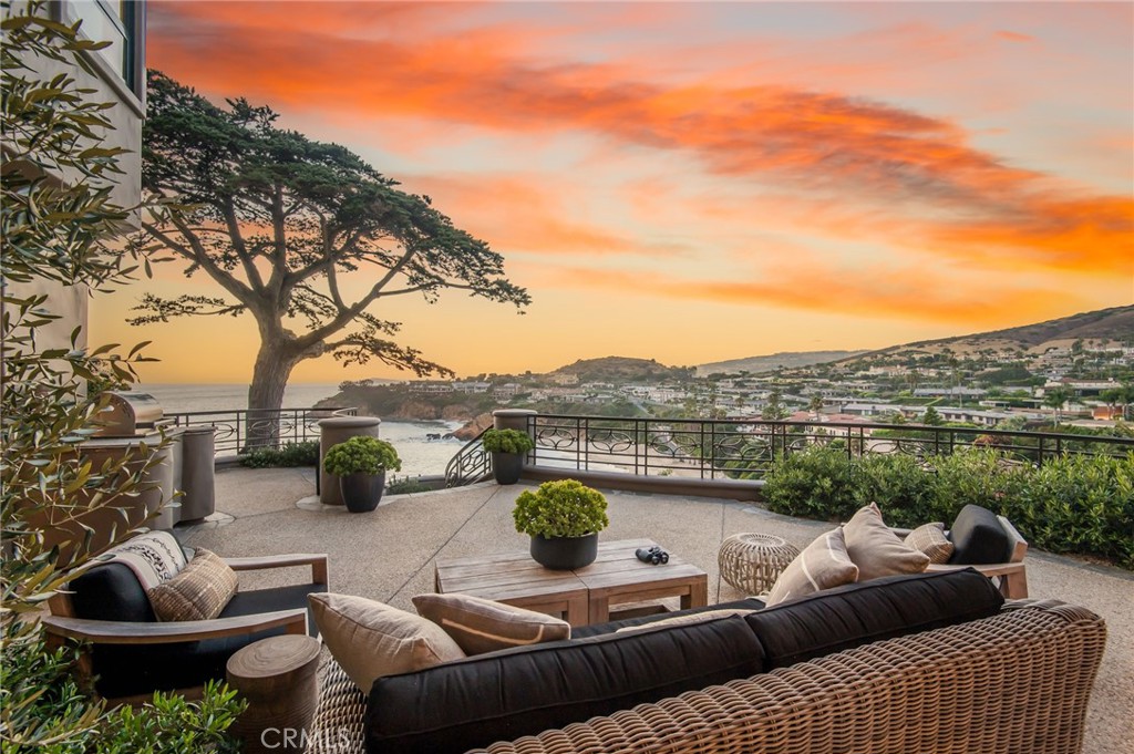 199 Emerald Bay Laguna Beach, CA 92651 - Photo 32 of 33 a view of a terrace with couches and potted plants