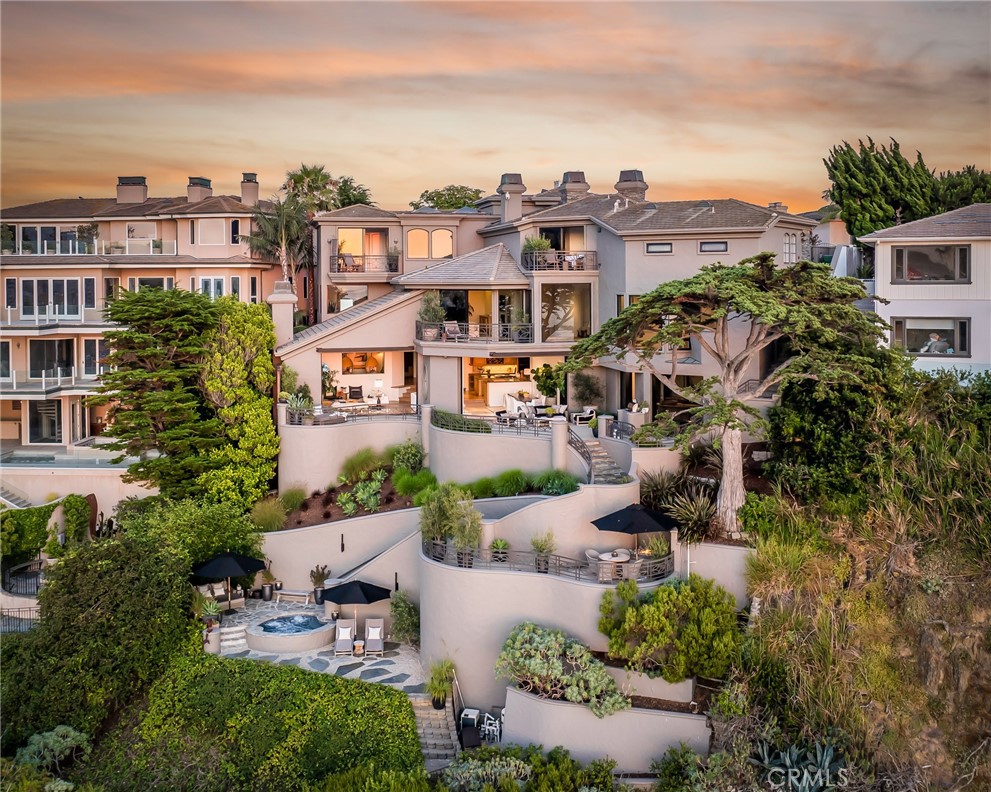 199 Emerald Bay Laguna Beach, CA 92651 - Photo 4 of 33 an aerial view of multiple houses with a yard