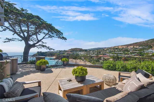 a view of a terrace with furniture