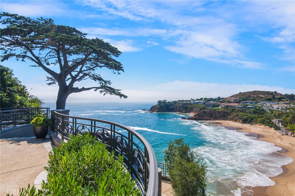 199 Emerald Bay Laguna Beach, CA 92651 - Photo 8 of 33 a view of a swimming pool with a yard