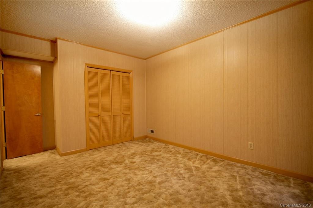 503 Jim Dobbins Road Rutherfordton, NC 28139 - Photo 12 of 34 a view of an empty room