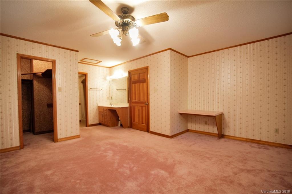 503 Jim Dobbins Road Rutherfordton, NC 28139 - Photo 20 of 34 a view of an empty room with a window