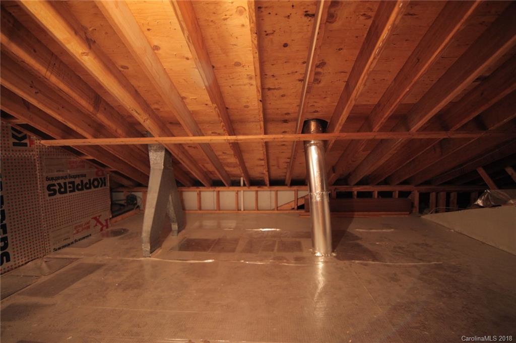 503 Jim Dobbins Road Rutherfordton, NC 28139 - Photo 26 of 34 a view of an empty room with wooden floor