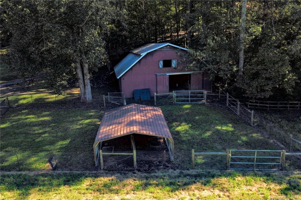 503 Jim Dobbins Road Rutherfordton, NC 28139 - Photo 28 of 34 a view of backyard with barbeque grill and potted plants