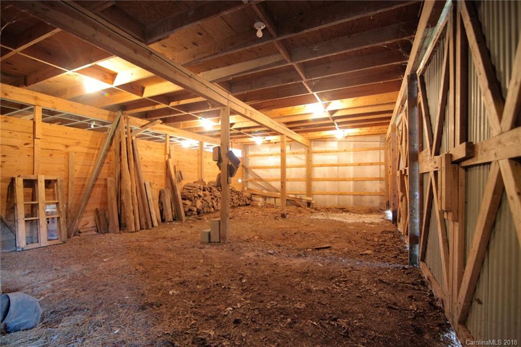 503 Jim Dobbins Road Rutherfordton, NC 28139 - Photo 34 of 34 a view of an empty room with wooden walls