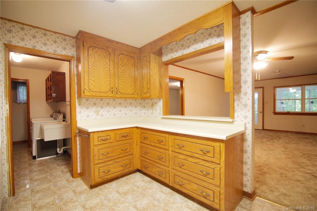 503 Jim Dobbins Road Rutherfordton, NC 28139 - Photo 5 of 34 a bathroom with a sink and a mirror