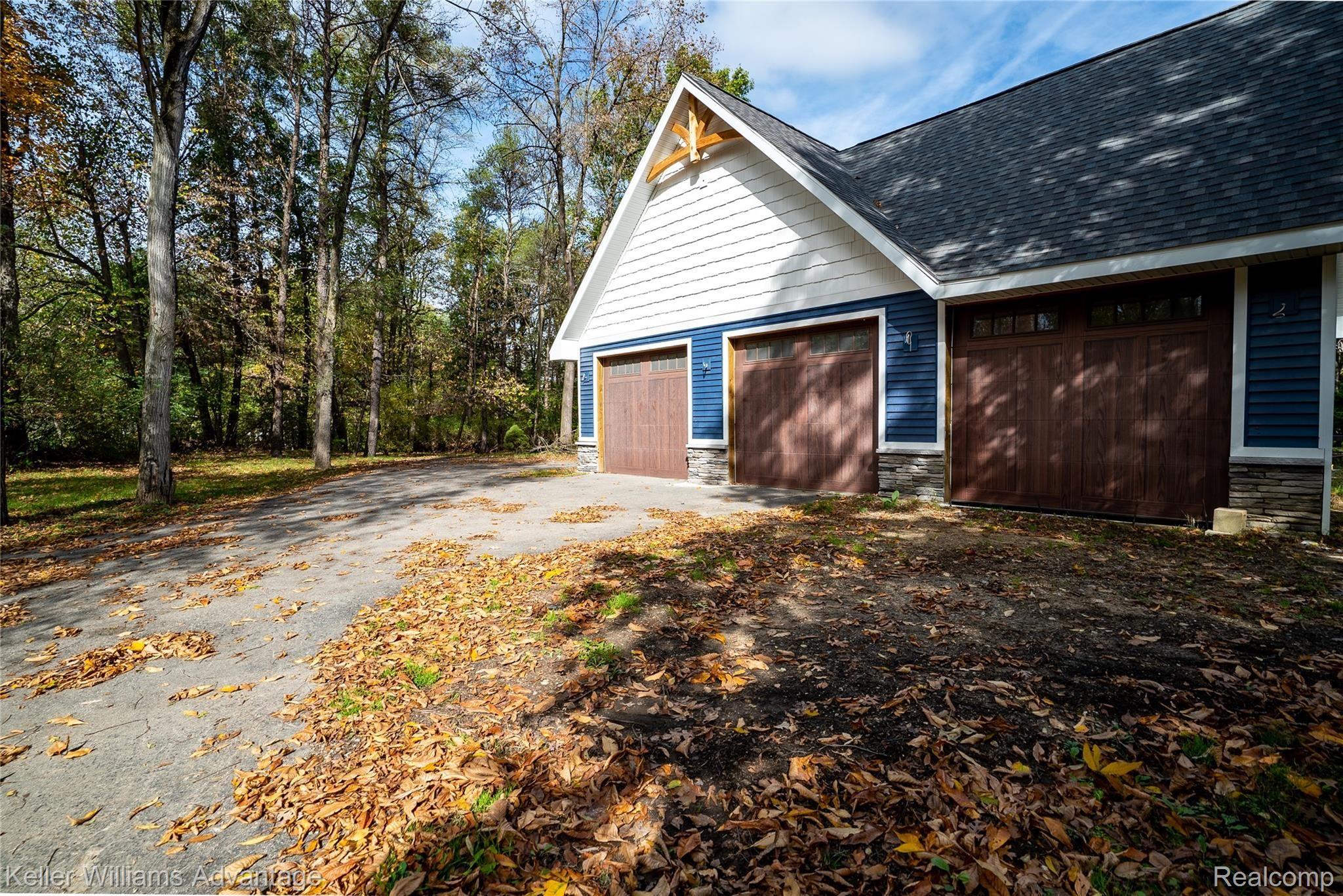 5403 Pleasant Valley Road Brighton, MI 48114 - Photo 14 of 24 PleasantValleyRd_5403_Side 1.jpg