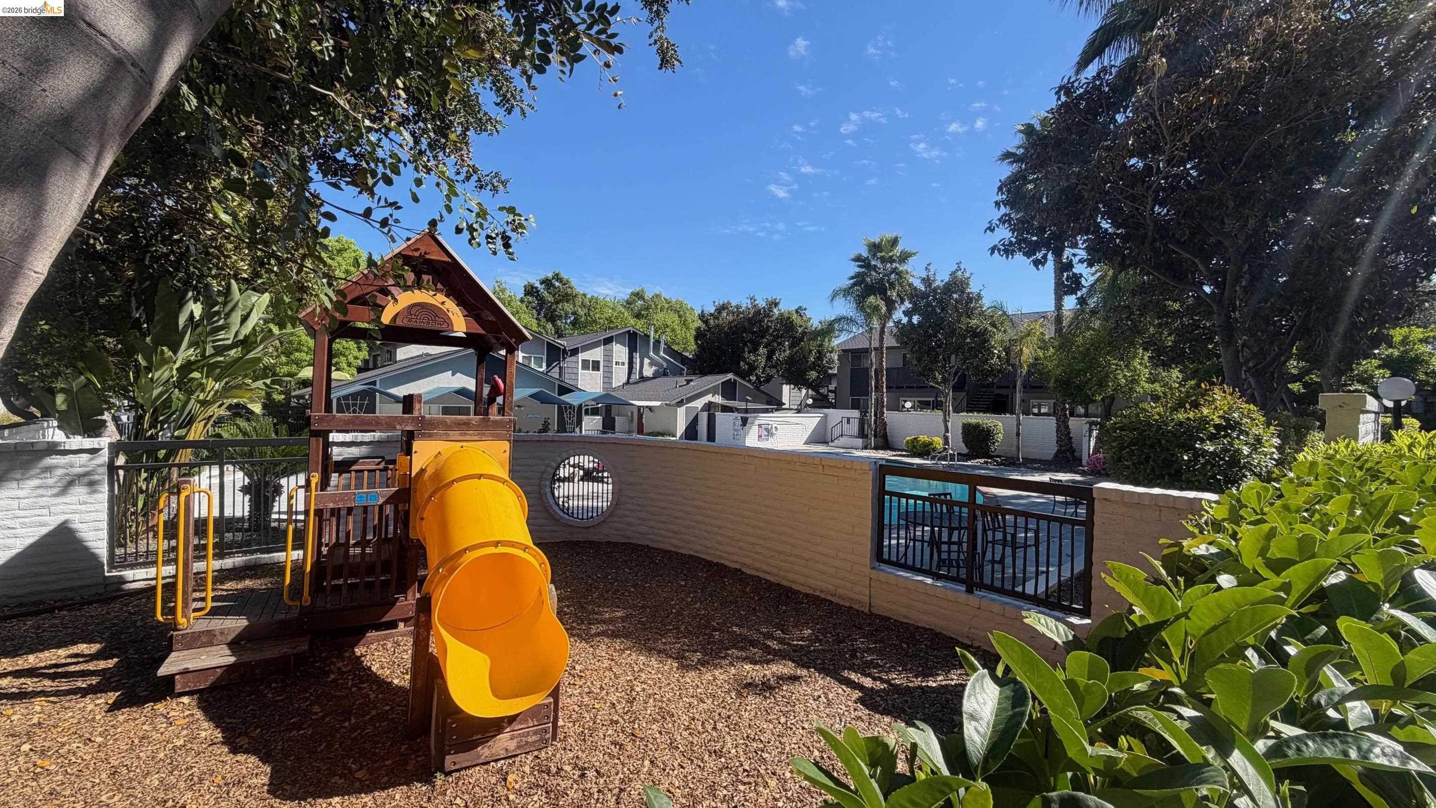 9085 Alcosta Boulevard, Unit 331 San Ramon, CA 94583 - Photo 18 of 18 Communal playground with a residential view