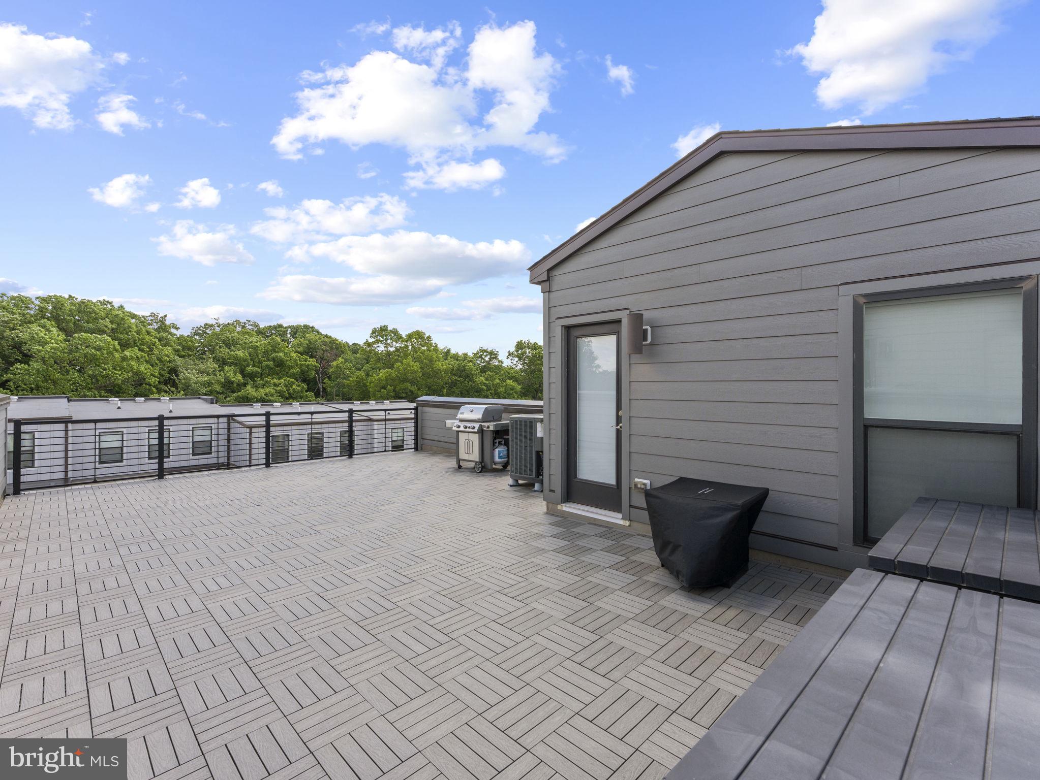 1616 Bandit Loop, Unit 10B Reston, VA 20190 - Photo 22 of 24 a view of a terrace with furniture