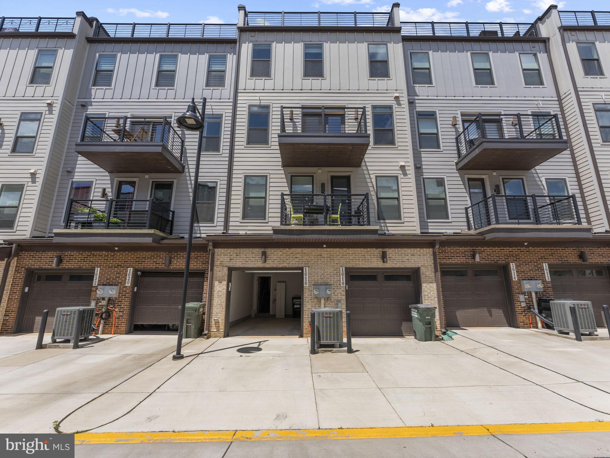1616 Bandit Loop, Unit 10B Reston, VA 20190 - Photo 24 of 24 a front view of residential houses