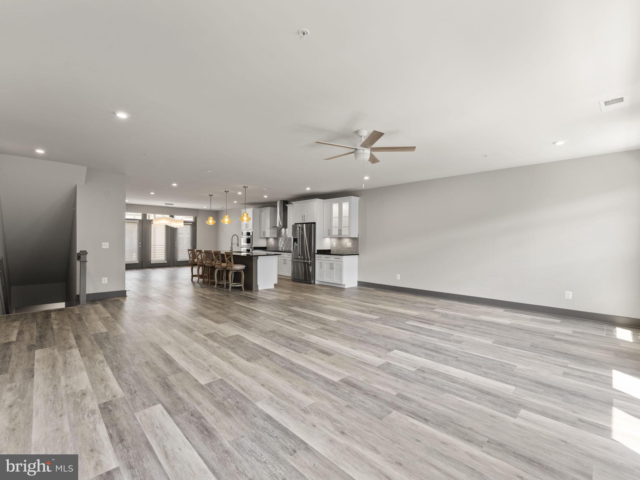 1616 Bandit Loop, Unit 10B Reston, VA 20190 - Photo 5 of 24 a view of kitchen and kitchen with sink wooden floor