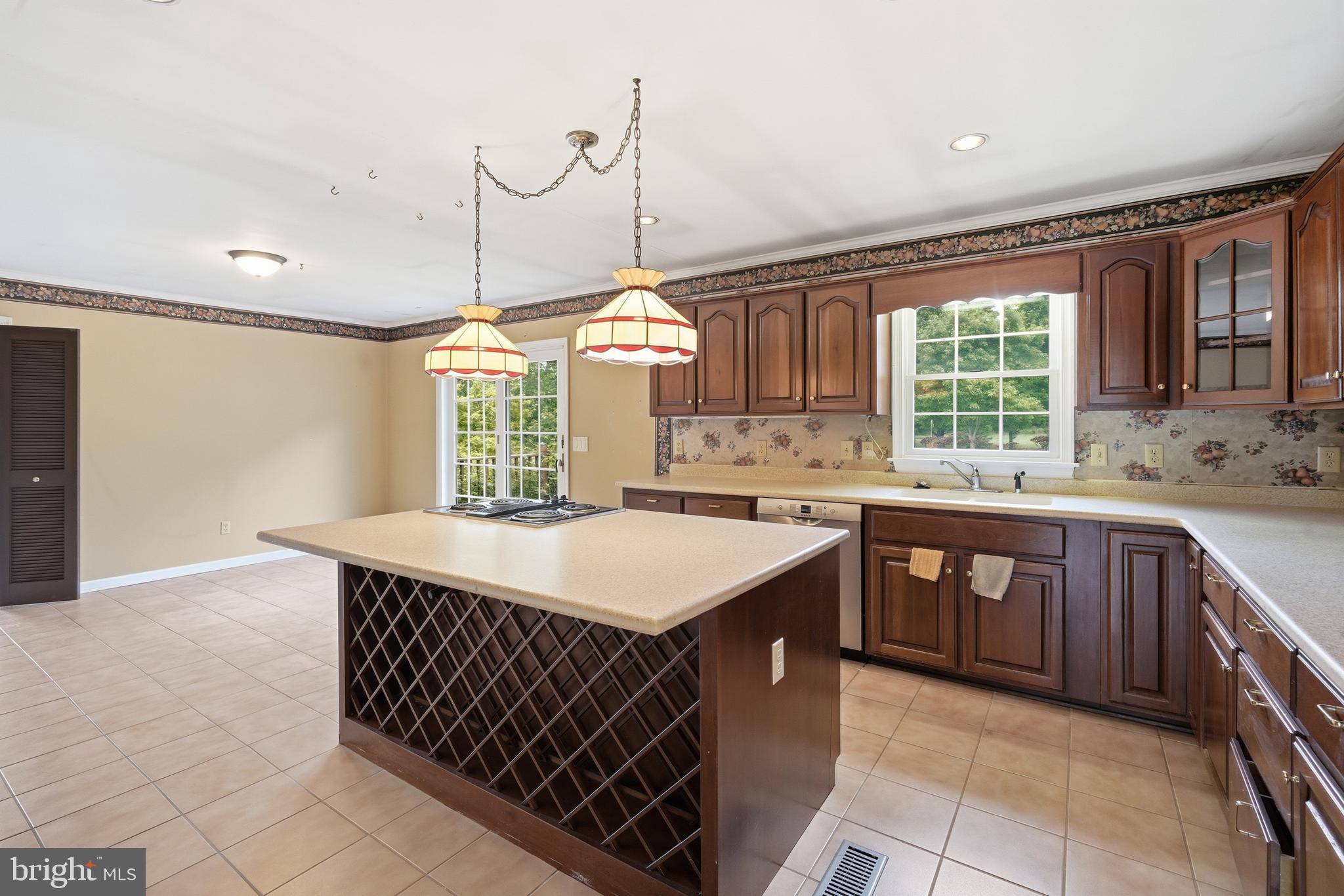 30050 Beaver Dam Road Trappe, MD 21673 - Photo 12 of 41 Plenty of wine storage in the island