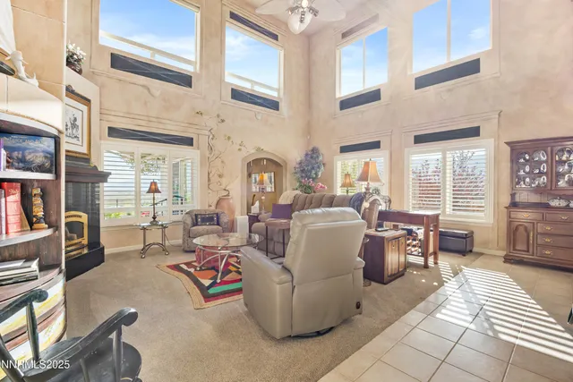 a view of a patio with dining table and chairs
