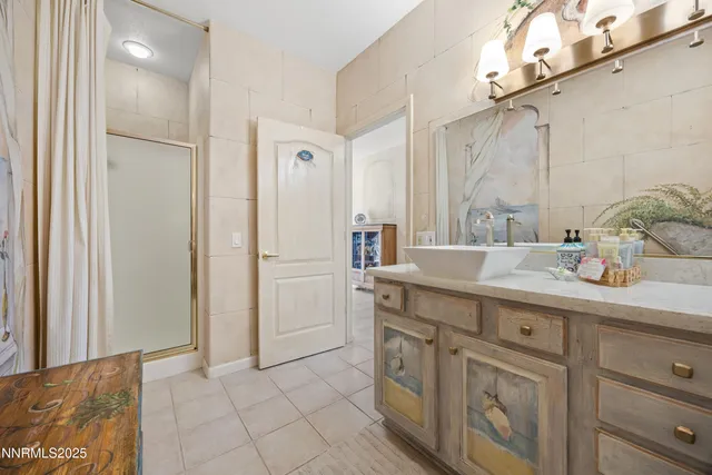 a view of a chairs and table in a patio