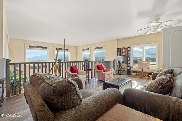 a living room with furniture or couch and a window