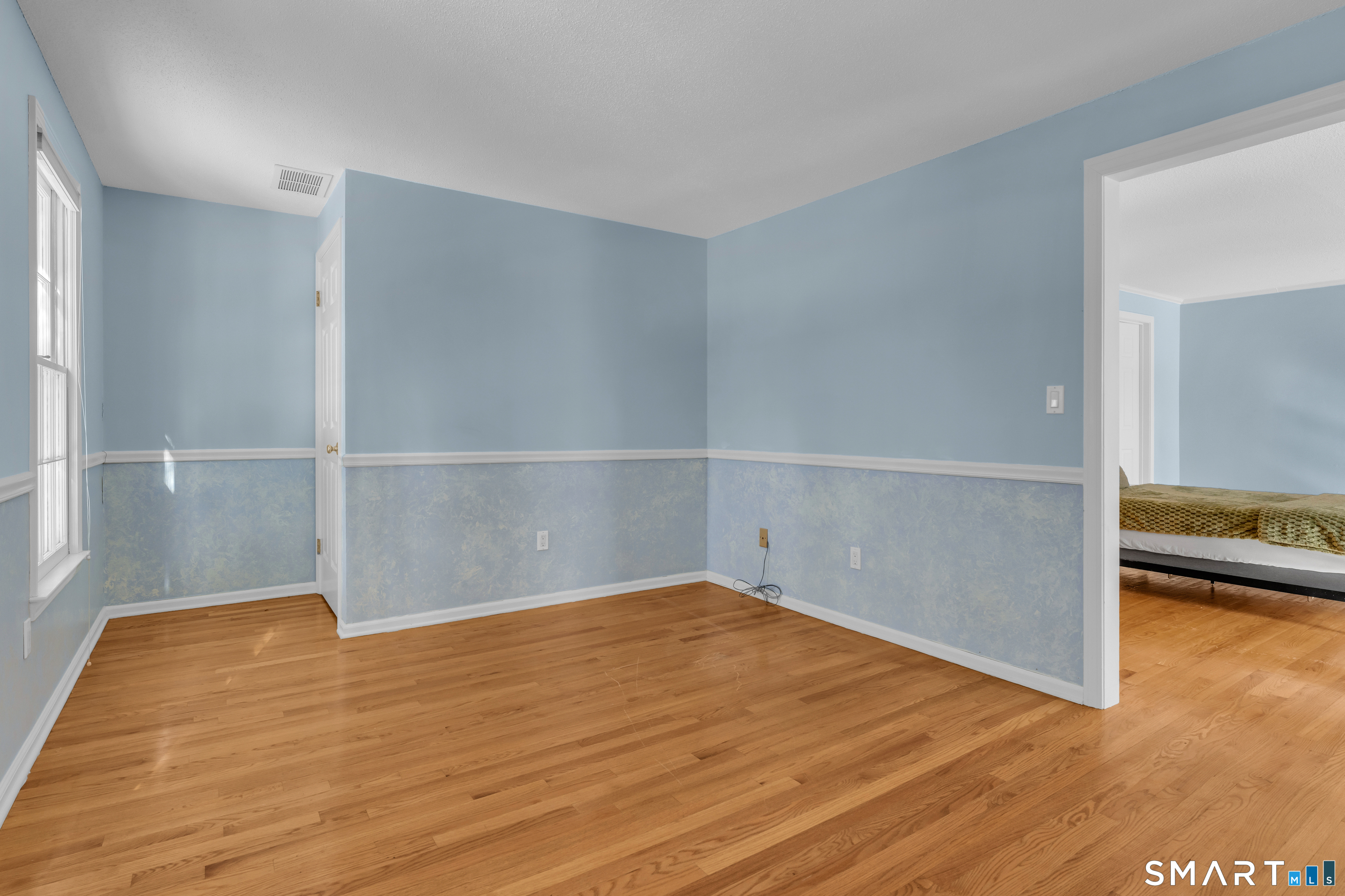 2 Esterly Farms Road, Unit 2 Madison, CT 06443 - Photo 21 of 40 This versatile room is ready to be transformed to suit your needs! The walk-up attic door is conveniently located on the left.