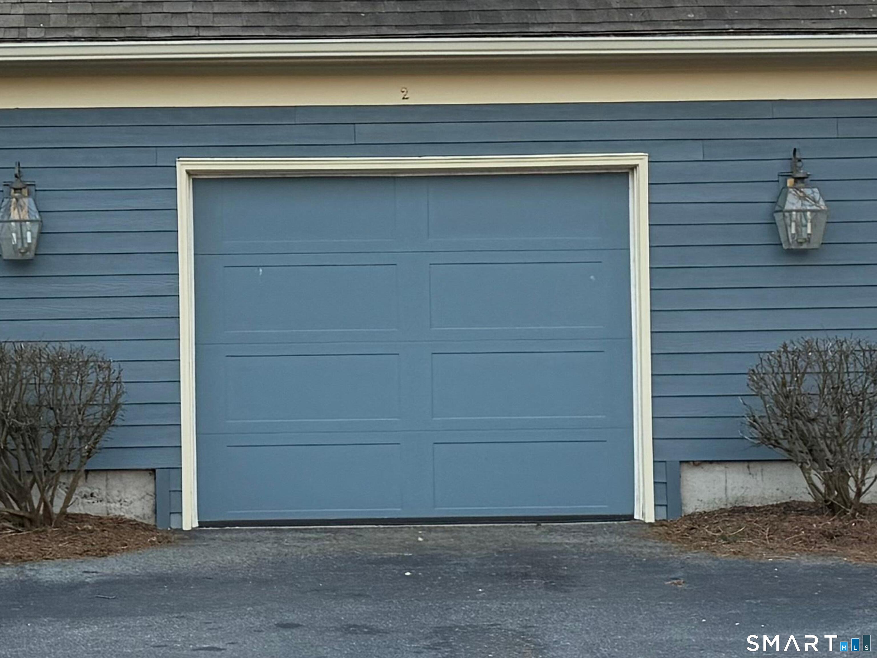 2 Esterly Farms Road, Unit 2 Madison, CT 06443 - Photo 28 of 40 a side view of a house
