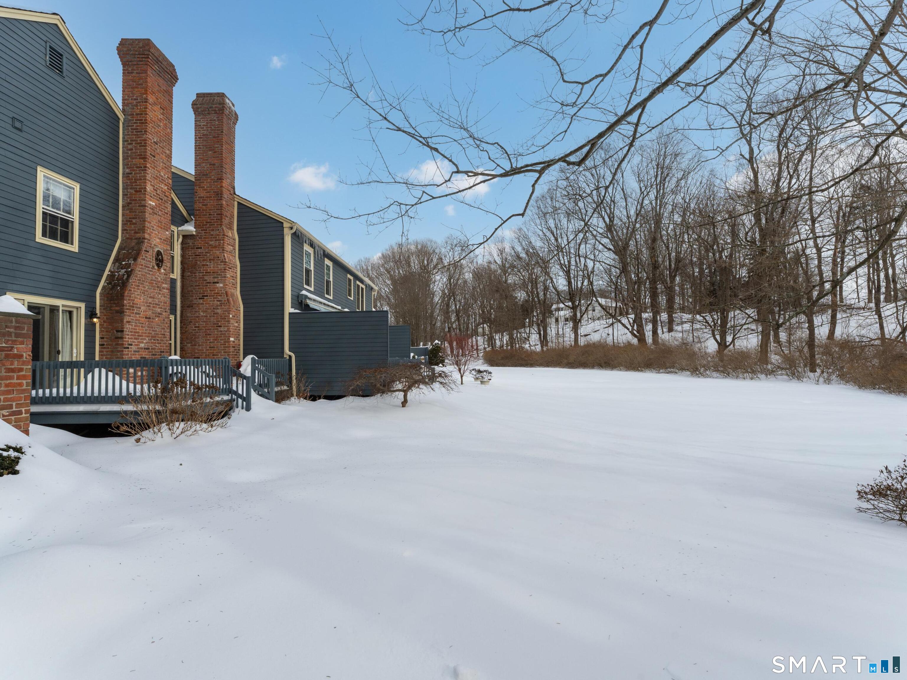 2 Esterly Farms Road, Unit 2 Madison, CT 06443 - Photo 31 of 40 Snow covered back yard