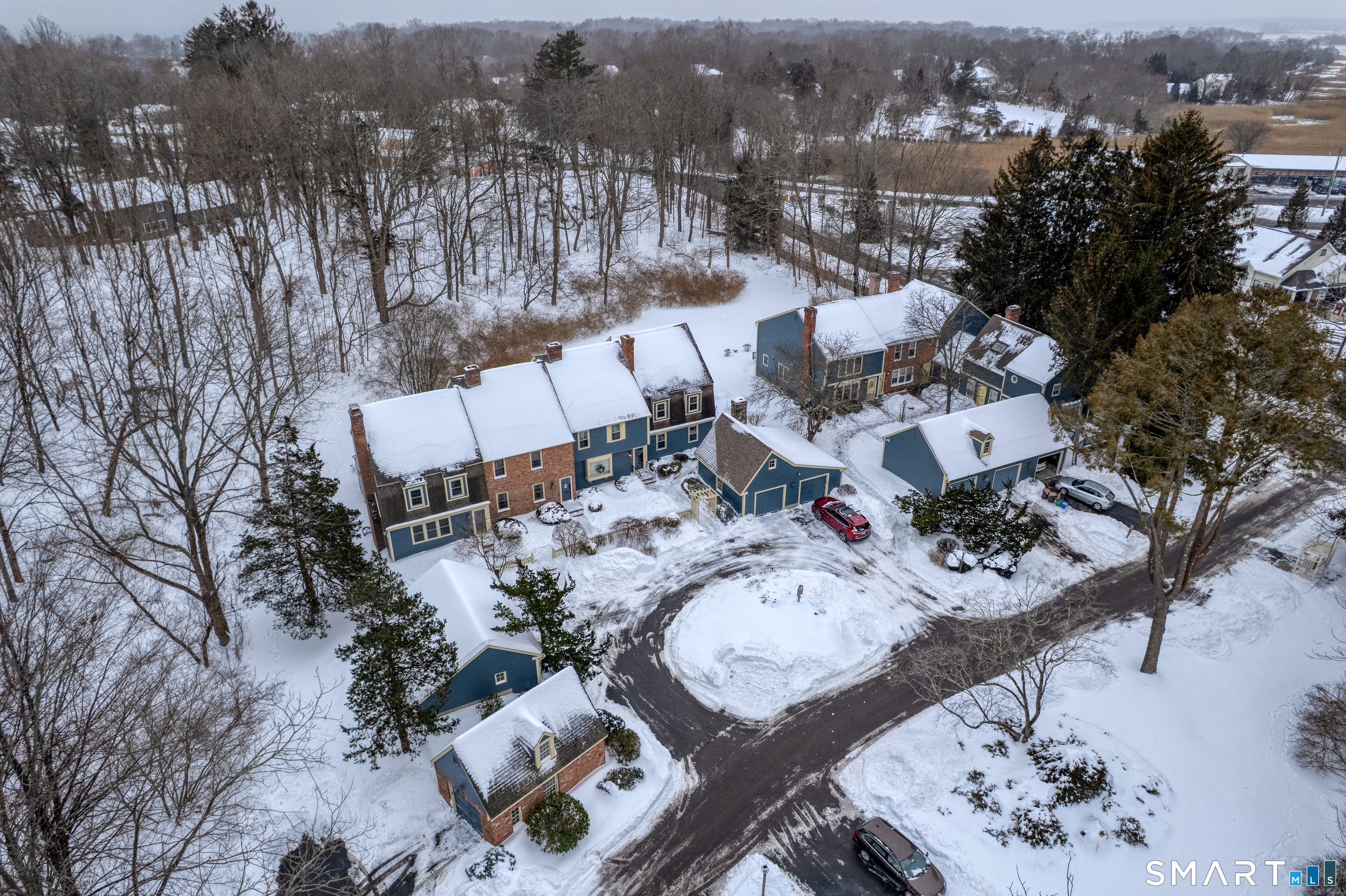 2 Esterly Farms Road, Unit 2 Madison, CT 06443 - Photo 33 of 40 Snow covered view from above this intimate complex