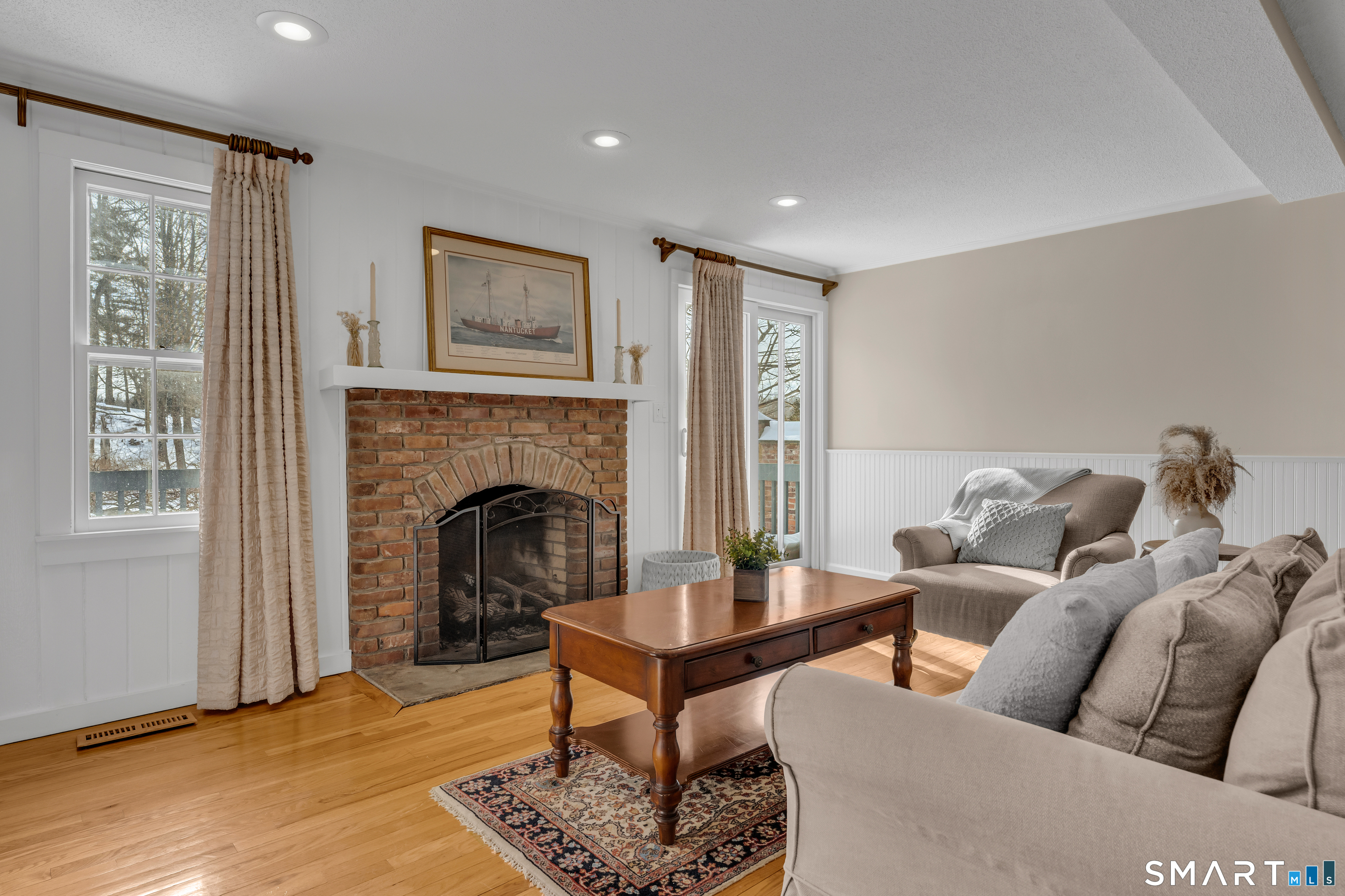 2 Esterly Farms Road, Unit 2 Madison, CT 06443 - Photo 3 of 40 Enjoy warm, cozy fires with the natural gas fireplace.