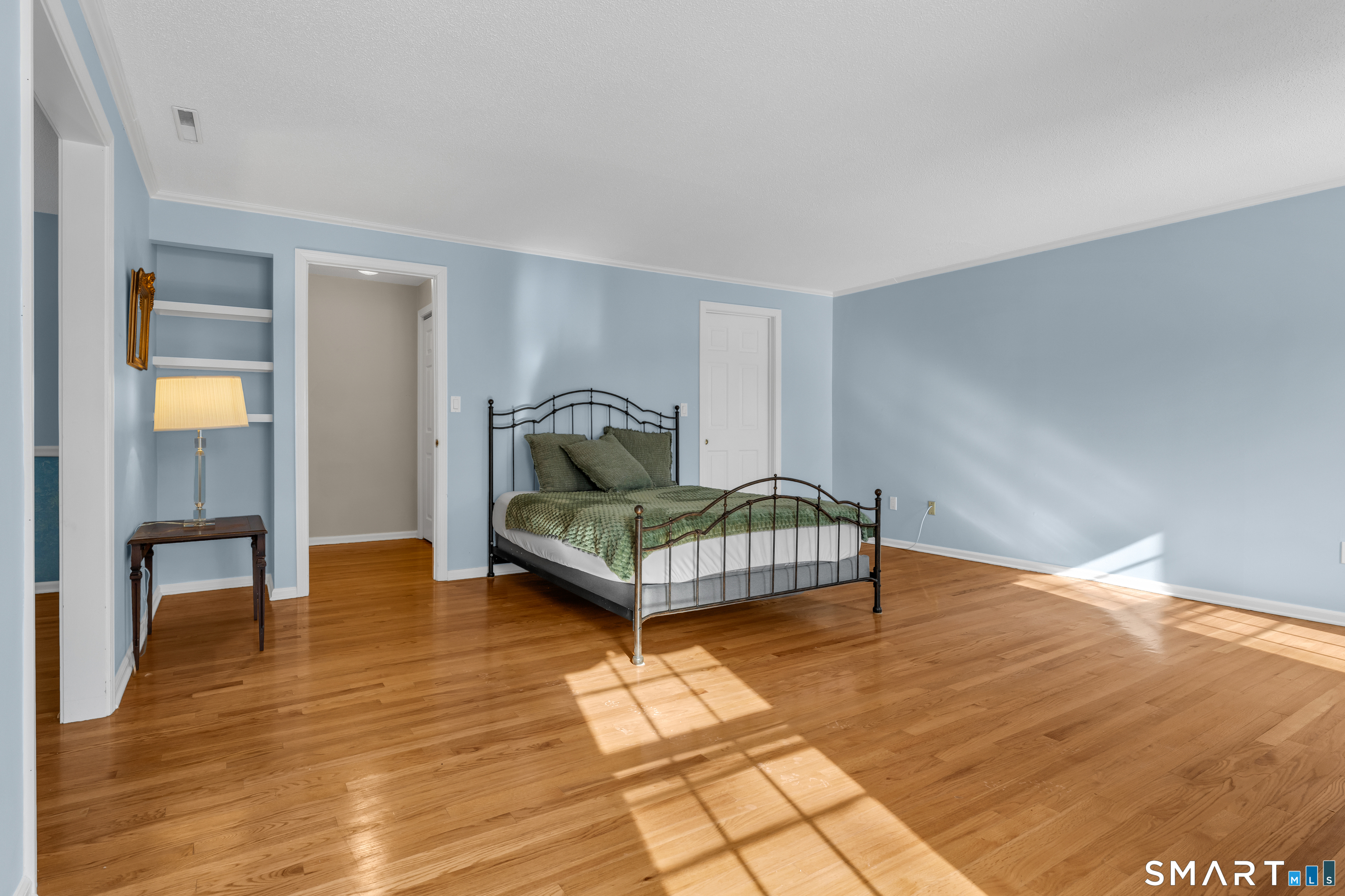 2 Esterly Farms Road, Unit 2 Madison, CT 06443 - Photo 6 of 40 a living room with furniture and wooden floor