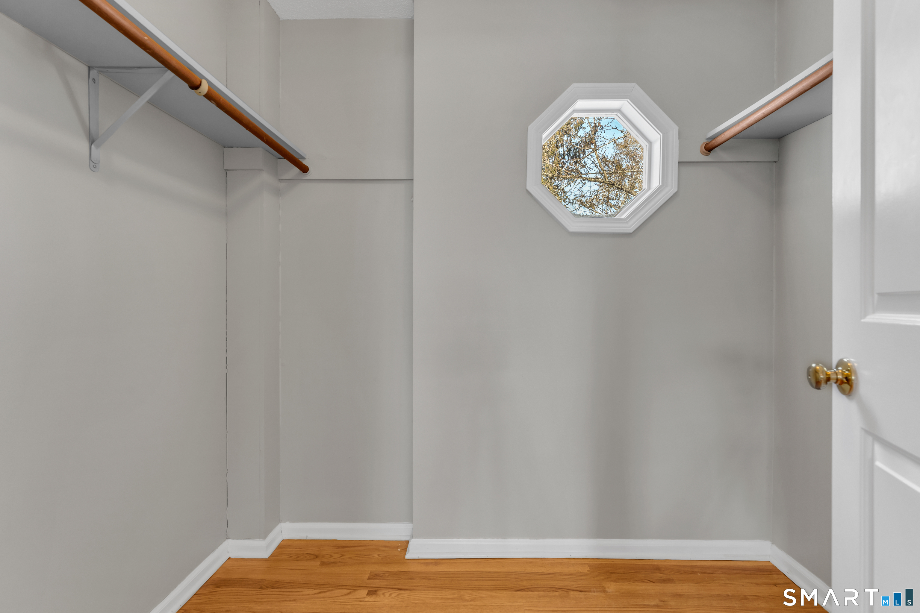 2 Esterly Farms Road, Unit 2 Madison, CT 06443 - Photo 7 of 40 a view of small space with racks on the wall