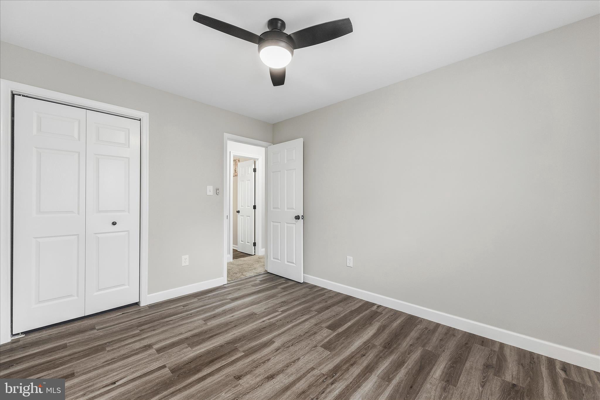 2209 227th Street Pasadena, MD 21122 - Photo 21 of 42 wooden floor in an empty room