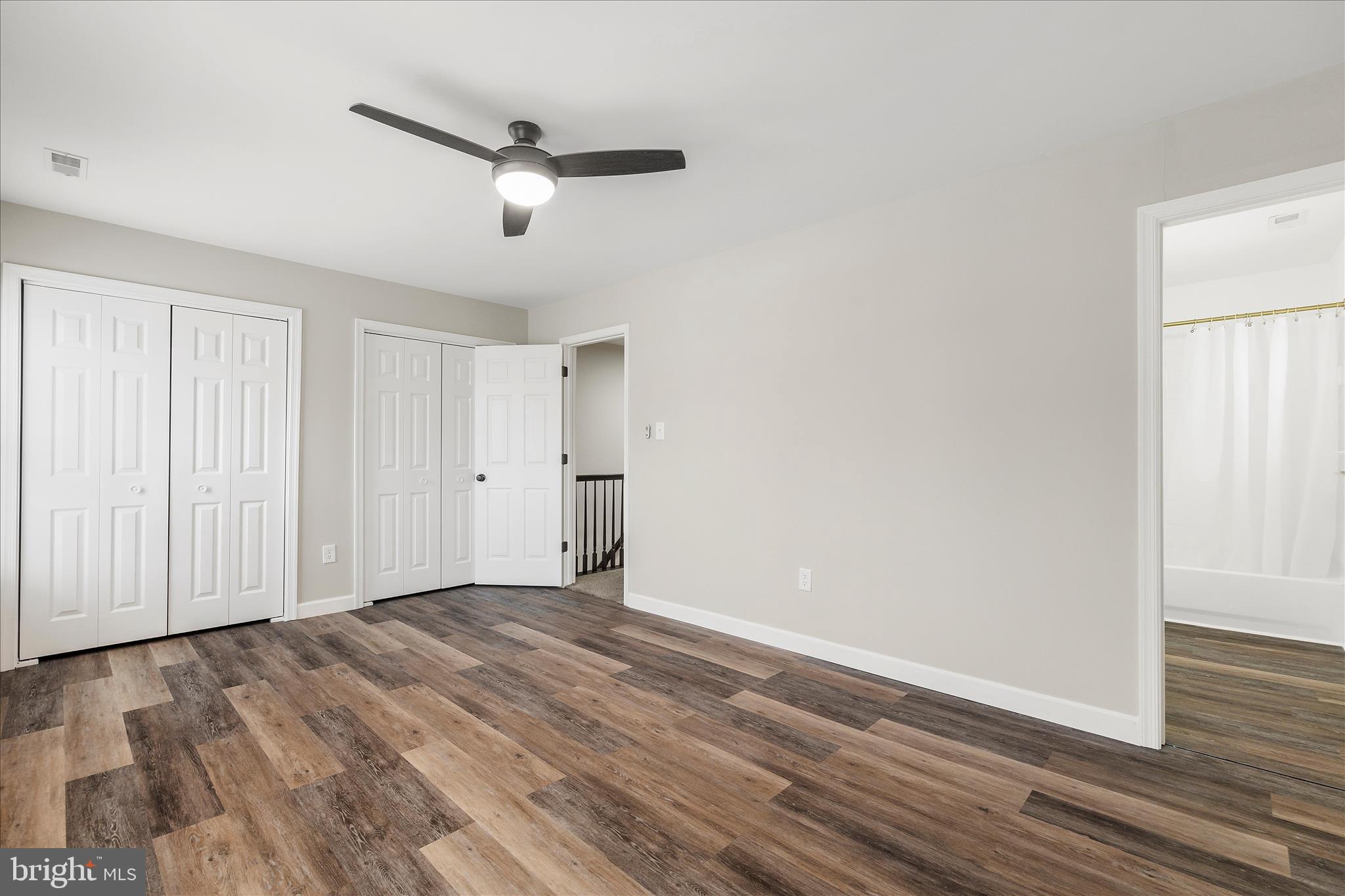 2209 227th Street Pasadena, MD 21122 - Photo 27 of 42 a view of an empty room with wooden floor