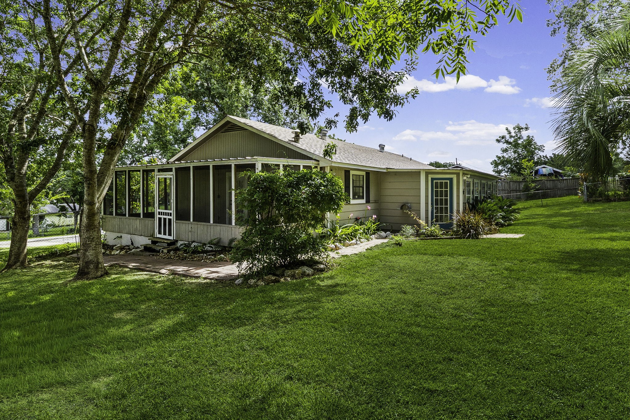 51 Rustling Oaks Coldspring, TX 77331 - Photo 31 of 43 View of side screened in patio