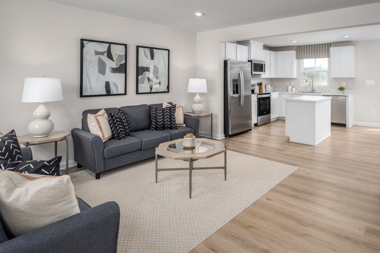 2901 Orchard Ridge Lane Harrisonburg, VA 22801 - Photo 5 of 14 a living room with stainless steel appliances furniture and a kitchen view