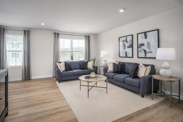 a living room with furniture and a couch