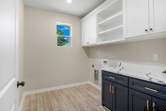 a view of cabinets with wooden floor and cabinets