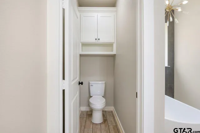 a bathroom with a toilet