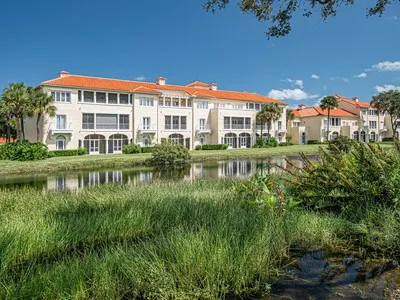 a view of a lake with a building in front of it