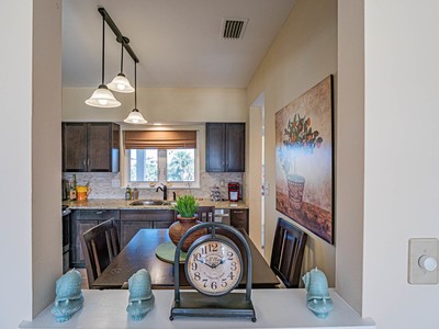 5075 Harmony Circle, Unit 302 Vero Beach, FL 32967 - Photo 14 of 32 a dining room with furniture and window