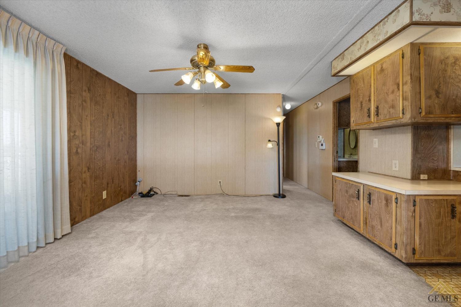 Undisclosed Address Bakersfield, CA 93306 - Photo 11 of 32 an empty room with windows