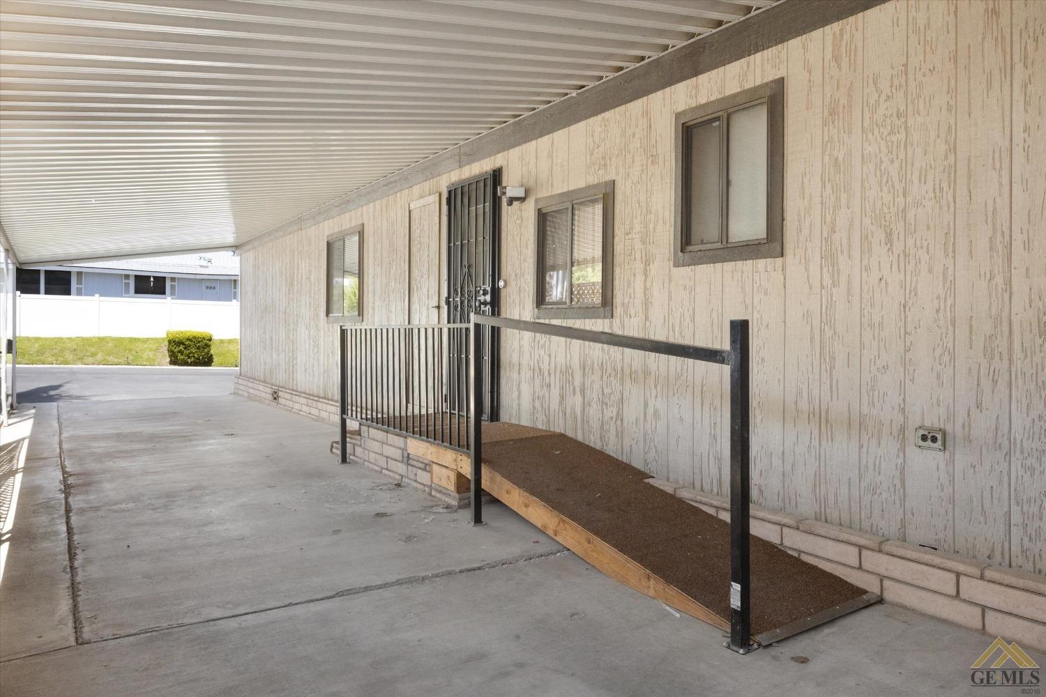 Undisclosed Address Bakersfield, CA 93306 - Photo 5 of 32 a view of an empty room with a window