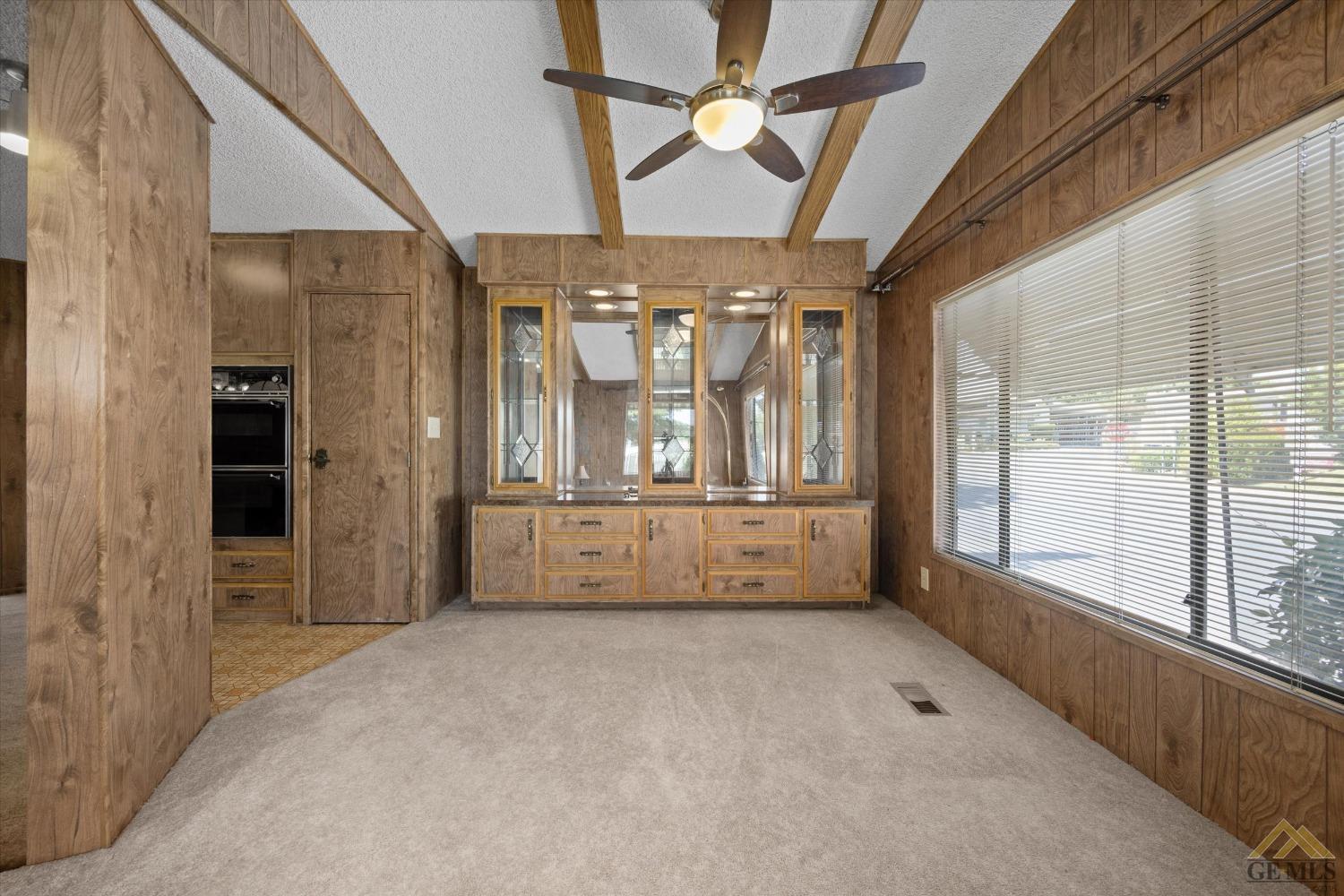 Undisclosed Address Bakersfield, CA 93306 - Photo 9 of 32 a view of an empty room with a window