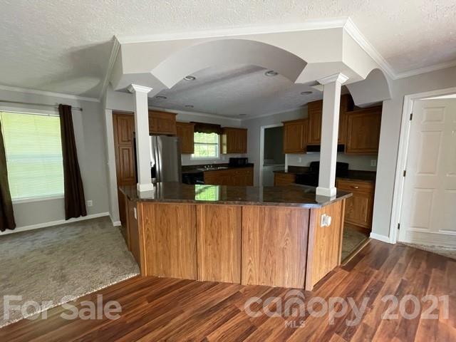 284 Pearidge Road Bostic, NC 28018 - Photo 22 of 29 a view of hallway with wooden floor and furniture