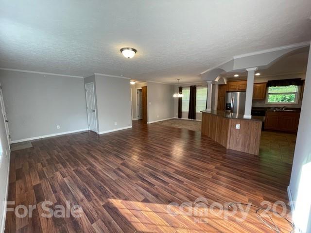 284 Pearidge Road Bostic, NC 28018 - Photo 26 of 29 a view of a big room with wooden floor and windows