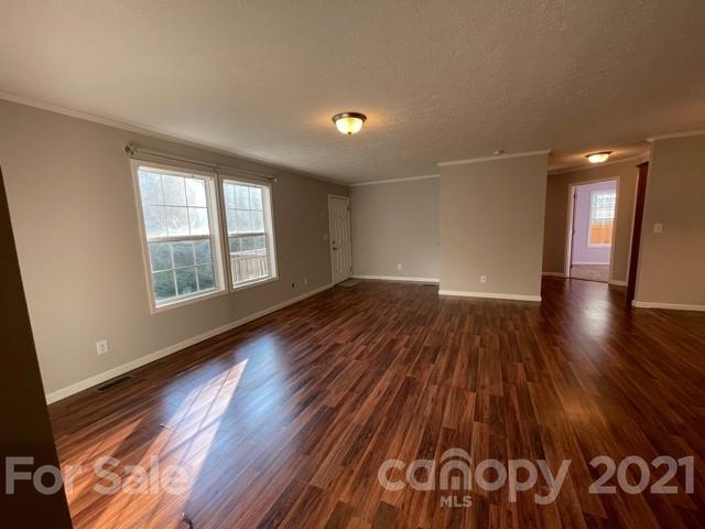 284 Pearidge Road Bostic, NC 28018 - Photo 4 of 29 wooden floor in an empty room with a window