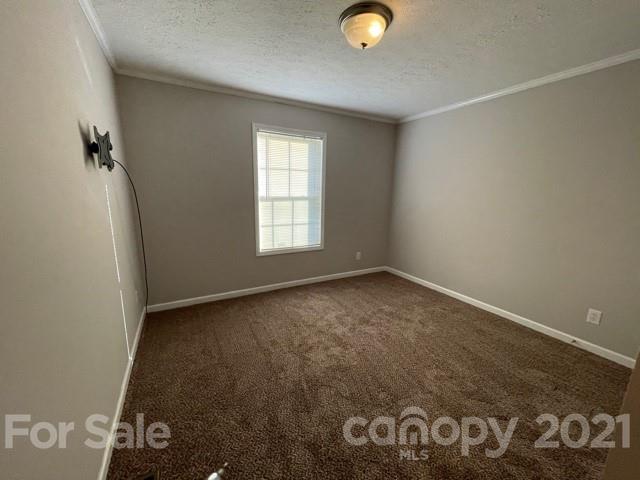 284 Pearidge Road Bostic, NC 28018 - Photo 7 of 29 an empty room with windows