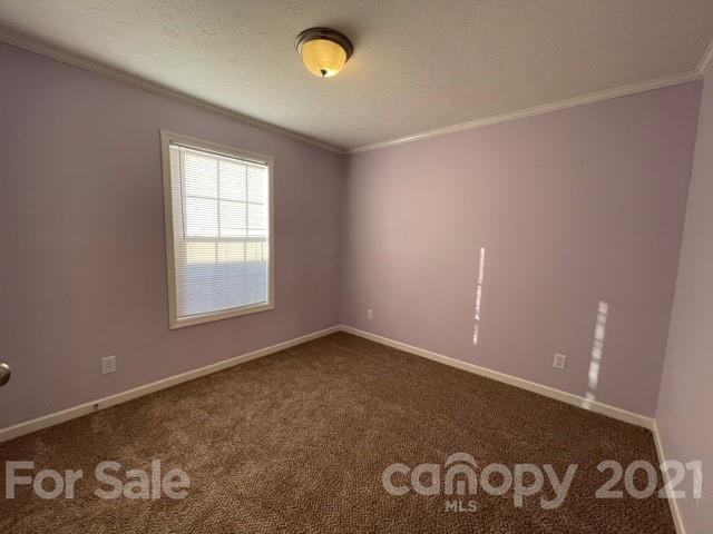 284 Pearidge Road Bostic, NC 28018 - Photo 9 of 29 an empty room with a window