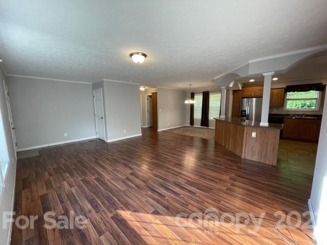 284 Pearidge Road Bostic, NC 28018 - Photo 10 of 29 a view of a living room a kitchen and an empty room