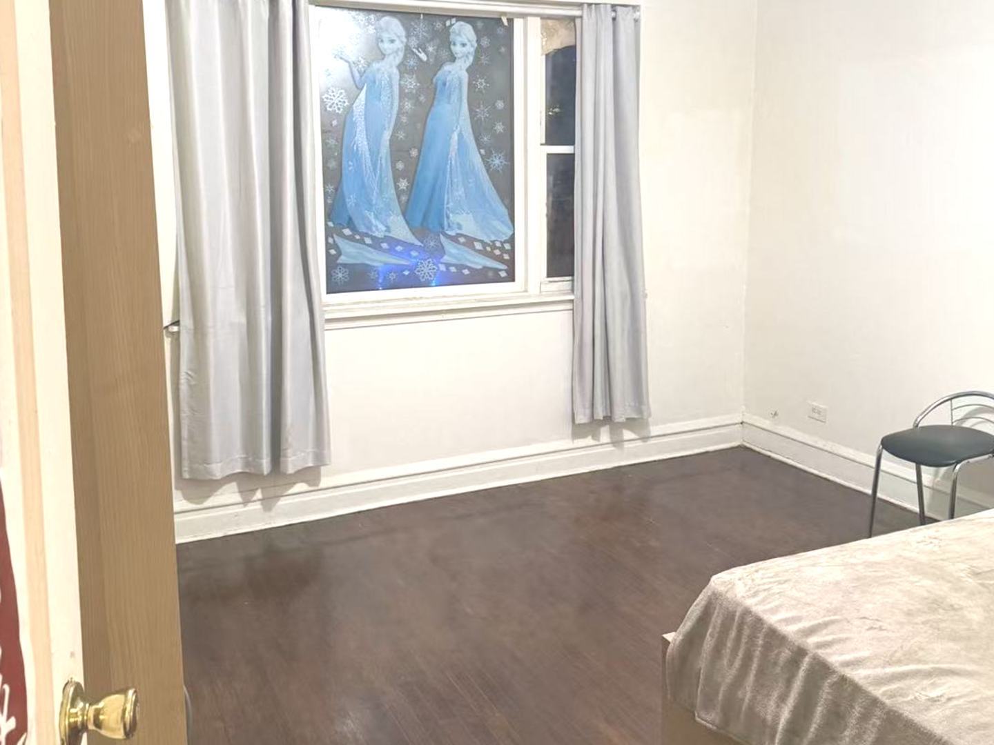 1705 West 35th Street Chicago, IL 60609 - Photo 6 of 12 a view of a room that has a window in it