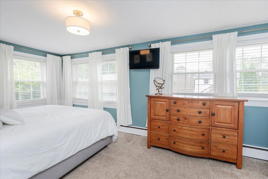 14 Francis Wyman Road Burlington, MA 01803 - Photo 19 of 39 a bedroom with a bed and flat screen tv